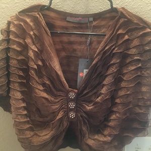 A brown Pretty Angel shrug size Large 55% Silk